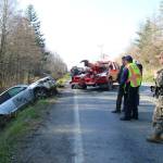 Photo by Luisa Loi
Last Friday, a vehicle rolled down the side of the road and fell about 30 feet onto a dirt road by East Crescent Harbor Road on North Whidbey. The driver was uninjured.
Photo by Luisa Loi
A tow truck pulled out an SUV from the dirt road at the bottom of a 30-foot drop following an accident at East Crescent Harbor Road last Friday.
