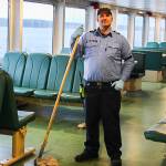 As an ordinary seaman, Joey Kirkmans job consists of making announcements, ensuring that the boat is clean, and escorting passengers during emergencies. (Photo by Luisa Loi)