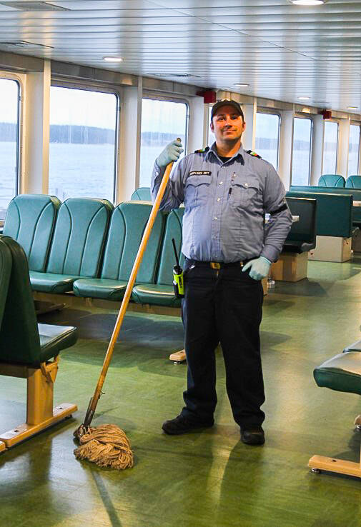 As an ordinary seaman, Joey Kirkmans job consists of making announcements, ensuring that the boat is clean, and escorting passengers during emergencies. (Photo by Luisa Loi)