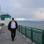 Captain Mark Gripp walks to the other side of the Kennewick to assist with landing in Port Townsend. (Photo by Luisa Loi)