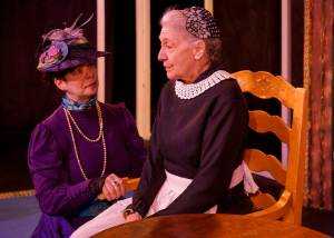 Photo by David Welton
Nora (Patricia Duff) speaks with the familys nanny, Anne Marie (Shelley Hartle).