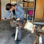 Photo provided
Rebecca Fakkema uses a stock knife on a finished demo shoe at Dev Travers house. Fakkema visited the Travers a few weeks ago as she is interested in learning the art of klompen carving.