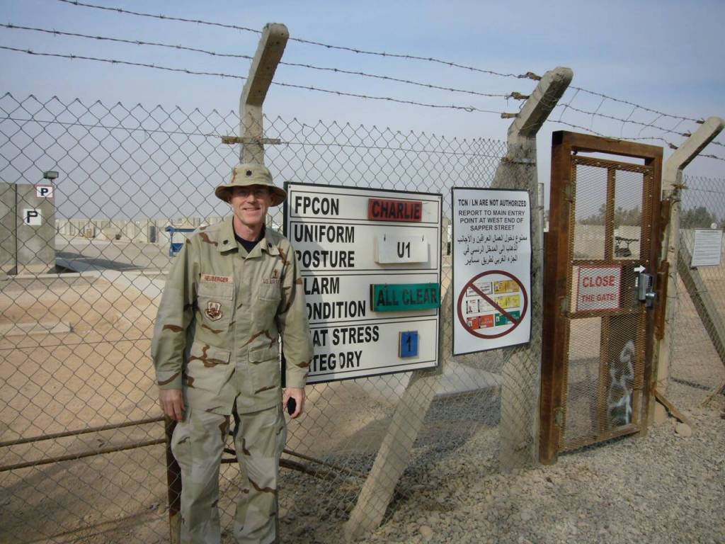 Photo courtesy of Jeffrey Neuberger
Chaplain, Lt Col, USAF (Ret) Jeffrey Neuberger stands before gate H6 in Iraq.