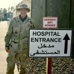 Chaplain, Lt Col, USAF (Ret) Jeffrey Neuberger stands at the military hospital entrance in Iraq. (Photo courtesy of Jeffrey Neuberger)