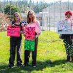 Photo by Luisa Loi
Two South Whidbey students hold signs by Maxwelton Road. Many of the protesters believe that, though Whidbey is far more accepting of LGBTQ+ communities than Oklahoma, students still experience bullying from their peers.