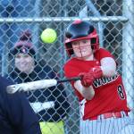 Teagan Calkins makes the ball go far, far away.