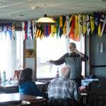 Retired Coastguardsman Jim Cushman leads a presentation on boat safety on Saturday at the Oak Harbor Yacht Club. (Photo by Sam Fletcher)