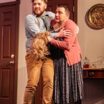Photo by Luisa Loi
Eric (played by Wesley Moran, at left) and Norman (Chris Kehoe) embrace in fear after Norman is caught impersonating Erics wife.