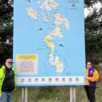Patrick Hussey and Carolyn ODell pose with the newly installed map. (Photo provided)