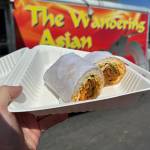 The Wandering Asian marinates their meats in secret family sauces, then wrap it with rice, purple cabbage, carrots, cilantro and more. (Photo provided)