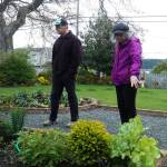 Gary (left) and Teresa Gillespie (right) display their garden, which will be in full bloom come June. (Photo by Sam Fletcher)