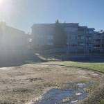 The lost material at Windjammer Park this past season created lips on the grass boundaries, which is a tripping hazard and interferes with the game. (Photo provided)