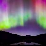 Gina Davenport-Shields captured the aurora with her phone Friday night, from Pass Lake. Mount Erie is visible on the background. (Photo by Gina Davenport-Shields)