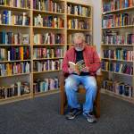 Photo by David Welton
Bob Markey reads from Barbarian Days: A Surfing Life by William Finnegan. Its one of many titles within his new bookstore, Mutiny Bay Books.