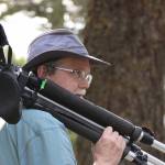 Steven Ellis carries his spotting scope through Fort Ebey State Park. (Photo provided)