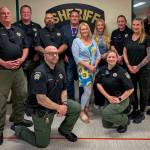 Photo by David Welton
From left, in the back row are Lt. Eric Bingham, Sgt. Tyler Melnick, Deputy Gerald Adams, Transitions Release Coordinator Leif Haugen, Substance Use Disorder Counselor Chelcee Lindell, Mental Health Professional Laurel Brown, Deputy Melissa Faivre, RN Jennifer Horn and Jose Briones. Kneeling in front are Deputy Adam Stalker and Deputy Katherine Schork.