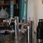 Photo by Caitlyn Anderson
Beer taps inside Crossed Arrows Brewery are curated by Stephen Chavez in Oak Harbor.
