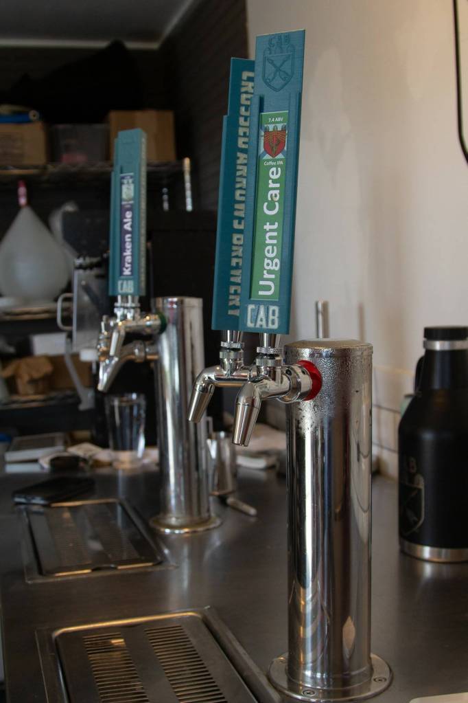 Photo by Caitlyn Anderson
Beer taps inside Crossed Arrows Brewery are curated by Stephen Chavez in Oak Harbor.