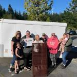 Photo provided
Animal rescue volunteers Summer Bowlin, Jackie Lasater and others pose with a new trap and drone as provided by community support.