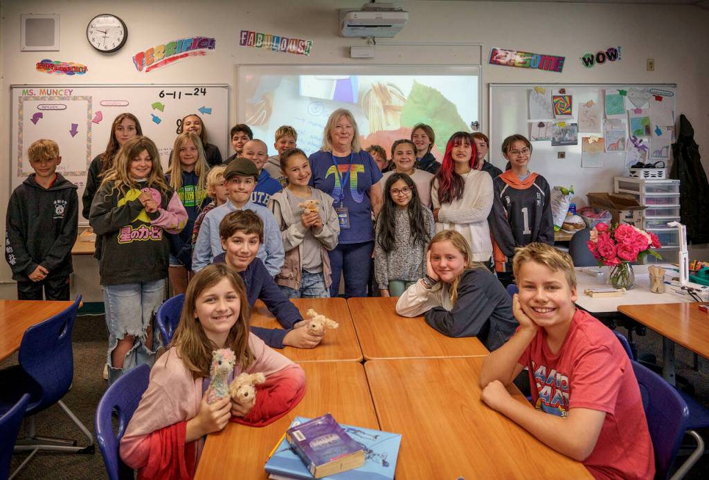 Photo by David Welton
Muncey stands with her classroom of students.