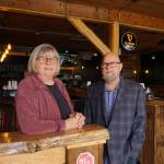 Mercedes Fulwiler, left, and Jason Tritt, co-owners of Barringtons Irish Bar & Grill on Pioneer Way, pose before their grand opening. (Photo by Sam Fletcher)