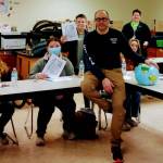 Photo provided
Suva Schooner Captain Brian Vick, center, led a maritime career presentation for Coupeville High School students.