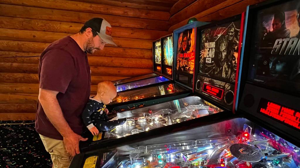 Photo provided
Tossin Axes patrons play pinball at Fridays launch tournament.