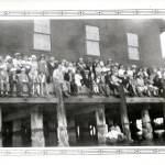 From the Collection of Island County Historical Society Museum Library and Archives. 2017.042.065
The audience admires the canoes racing at the Penn Cove Water Festival.