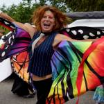 Photo by David Welton
A parade participant from Meander Dance Collective dances down the street at t