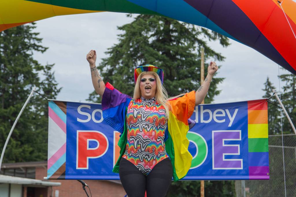By Caitlyn Anderson
A community came together joyfully and colorfully for the South Whidbey Pride Parade and other events in Langley on June 22. Above, drag queen Vivienne Paradisco performs after the parade.