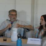 Steven Myres answers a question at the forum while his opponent, Marie Shimada, looks on. (Photo by Kira Erickson/South Whidbey Record)