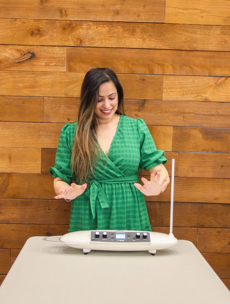 Mala Sooknanan plays the theremin, an electronic instrument that is played without physical contact. (Photo by Luisa Loi)