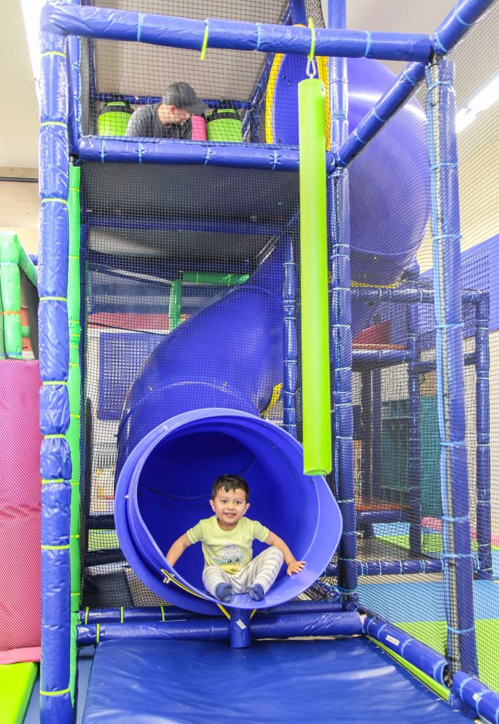 Ethan has fun on the slide. (Photo by Luisa Loi)