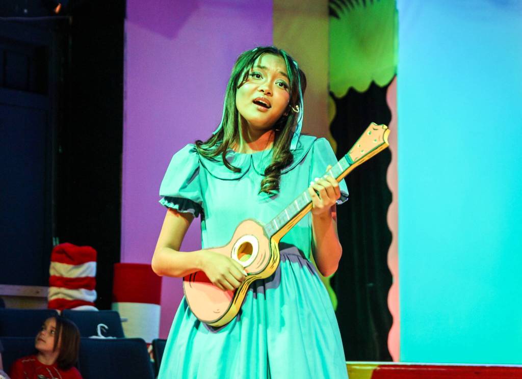 Ashley Mendoza (Gertrude McFuzz) plays the ukulele. Gertrude is a bird with one feather on her tail, and she falls in love with Horton. To win his heart, she finds a way to grow more feathers. (Photo by Luisa Loi)