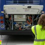 The hydrogen-powered guts of a new zero-emission Community Transit bus are seen under an open hood at the Community Transit Operations Base in Everett. (Ryan Berry / The Herald)