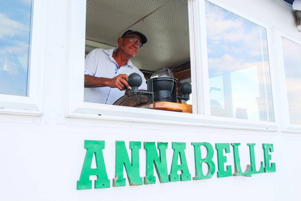 Dennis Redmon, who owns a captains license, drives his ferry house Annabelle. (Photo by Luisa Loi)