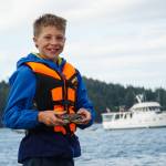 Photo by Sam Fletcher
Weston Stewart reveals his catch in Cornet Bay.