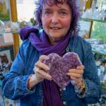 Llynya Carey with a heart-shaped amethyst geode. (Photo by David Welton)