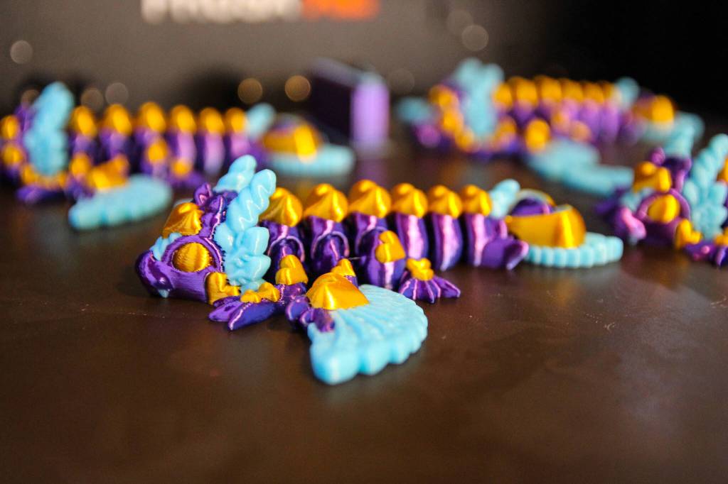 A group of multicolor dragons, freshly printed. (Photo by Luisa Loi)