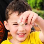 Orion, 4, shows a crystal to a Whidbey News-Times reporter. (Photo by Luisa Loi)