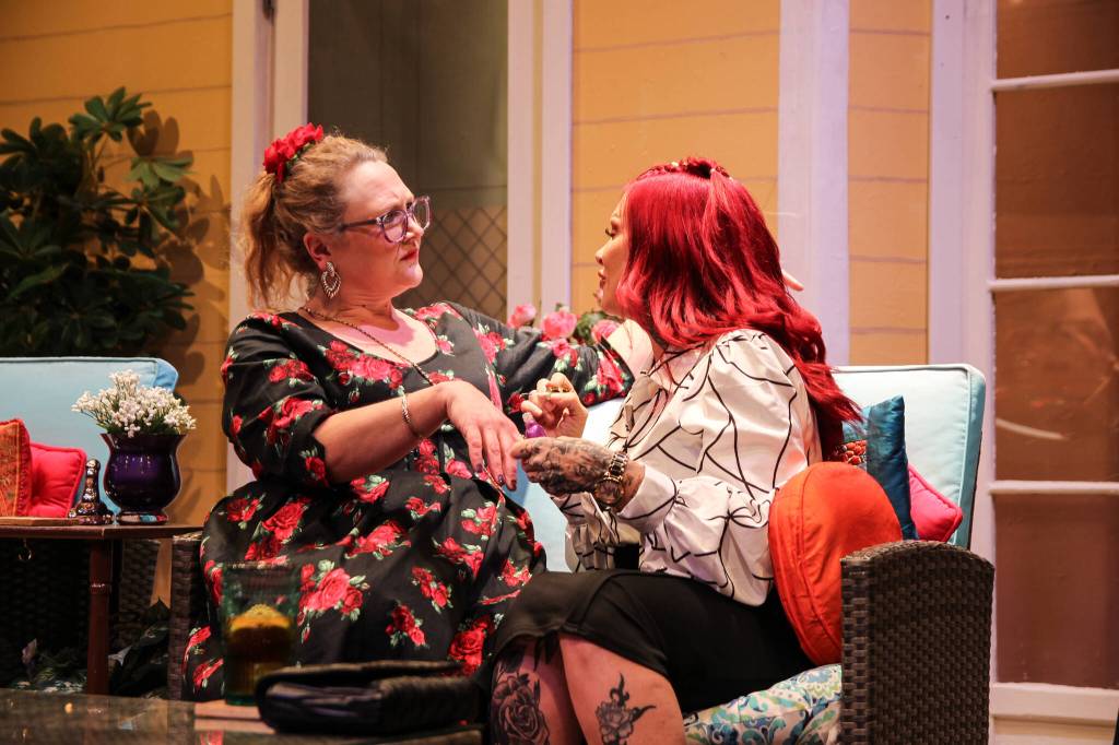 Dot (Amy Jones, at left) gets a manicure from Jinx (Rachel Warner). (Photo by Luisa Loi)
