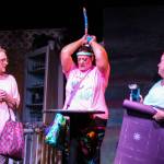 Marlafaye (Katie Jones, in the middle) demonstrates how she relieves stress following a messy divorce and a harrowing yoga class. (Photo by Luisa Loi)