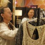 Photo by Kira Erickson/South Whidbey Record
Liz Smith, right, and her mother Ron Smith sift through a clothing rack at Island Boutique.
