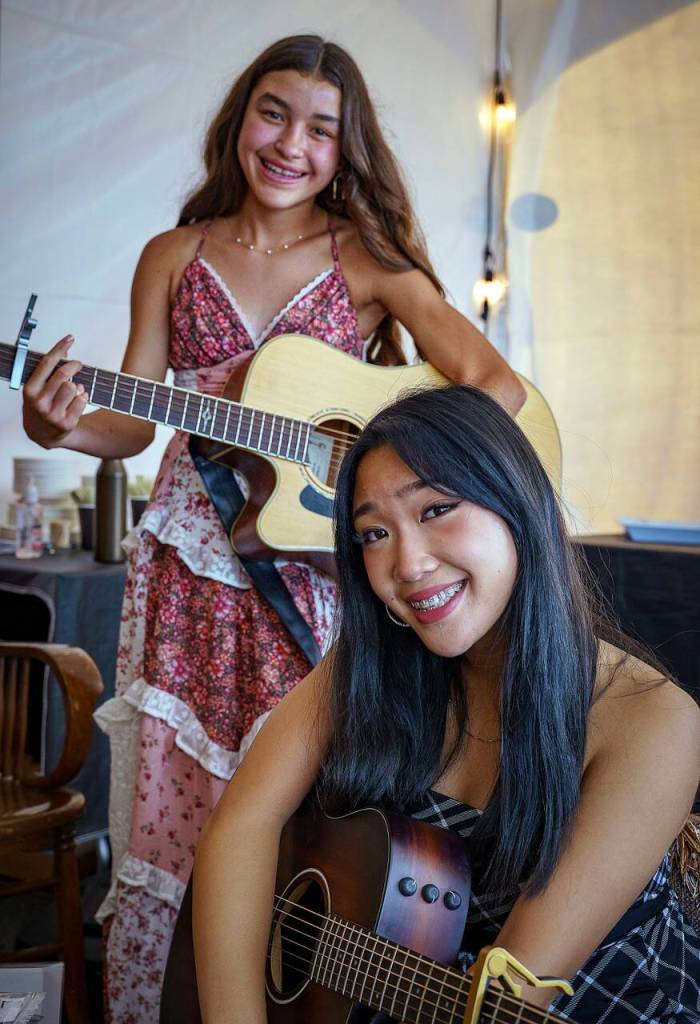 Photo by David Welton
At left, 15-year-old Adele Wood stands next to 16-year-old Danika Kloewer at the Oak Harbor Music Festials artist lounge. The two played at the Teen Talent Showcase on Sunday.