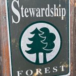 Students of WSU Extension Forestry receive Stewardship Forest plaques to hang on their property. (Photo by Kevin Zobrist)