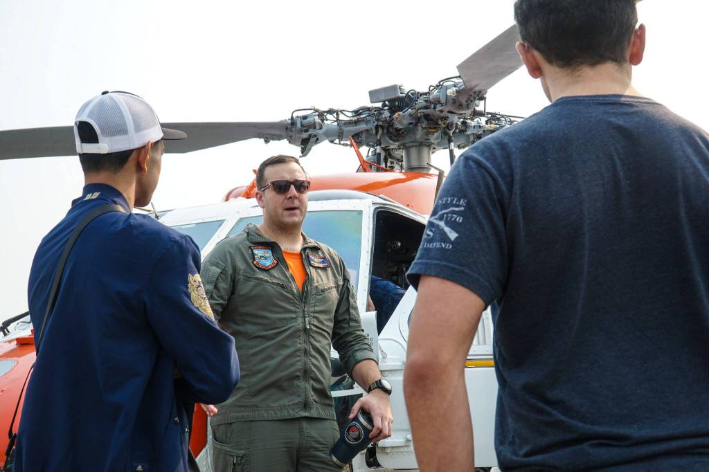 Photo by Sam Fletcher
Lt. Benjamin Dodson answers questions after a Search and Rescue helicopter demonstration flight on Saturday.
