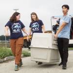 Photo by Sam Fletcher
SR3 interns Lindsey Austin, Lauren Johnson and Ryan Ling lug a seal to Windjammer Park, where it will be released.