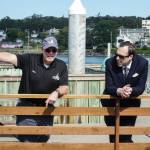 Harbor Master Chris Sublet (left) chats with Councilmember Bryan Stucky (right) over a recently repaired section of F Dock on Thursday morning. (Photo by Sam Fletcher)