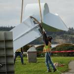 Photo by Sam Fletcher
Ram Construction staff hoist the horizontal Angel De Creatividad sculpture upright on Wednesday.