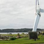 Ram Construction staff hoist the horizontal Angel De Creatividad sculpture upright on Wednesday. (Photo by Sam Fletcher)